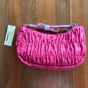 Collection 18 convertible crossbody bag in fuchsia pink. New with plastic & tag